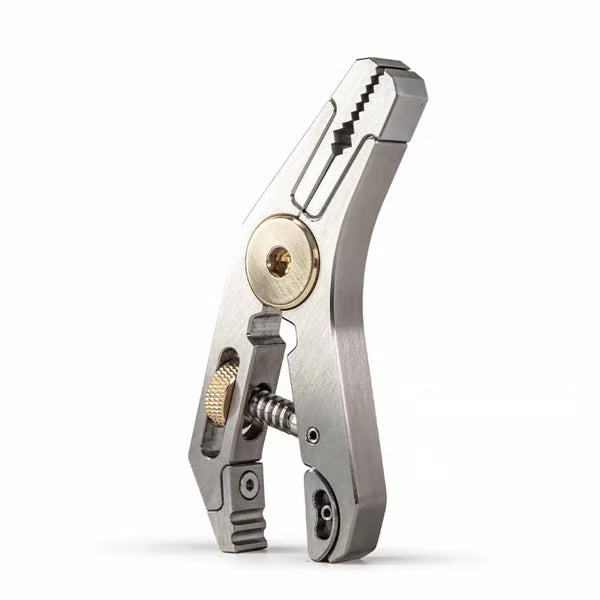Premium white Pocket Grip 5-in-1 multi-tool wrench and pliers combo, showcasing a modern minimalist desk setup aesthetic.